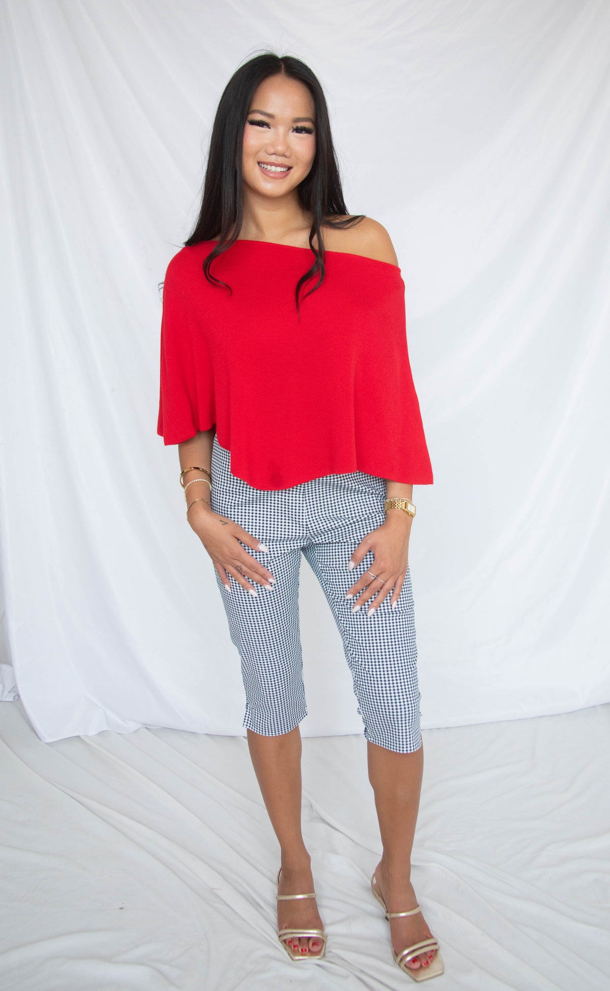 seeing red poncho knit top