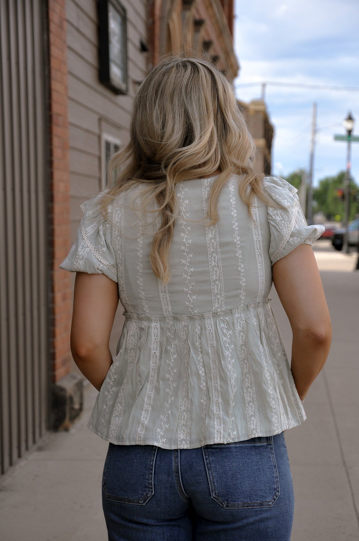 Embroidered Ruffle Sleeve Peplum Top