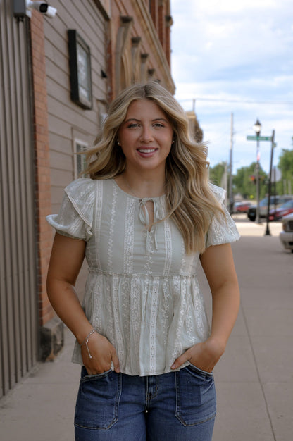 Embroidered Ruffle Sleeve Peplum Top